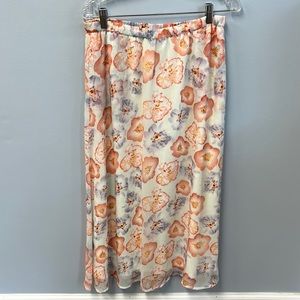 Kismet size medium maxi skirt, white with a nice peach and purple, floral print
